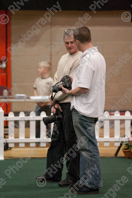 AWC 3548 
 Allan Brown and David Sidaway photographers comparing their toys 
 Keywords: 2009, England, UK, Worcester, Worcestershire, april, competition, heelwork to music, westglen, allan brown, david sidaway