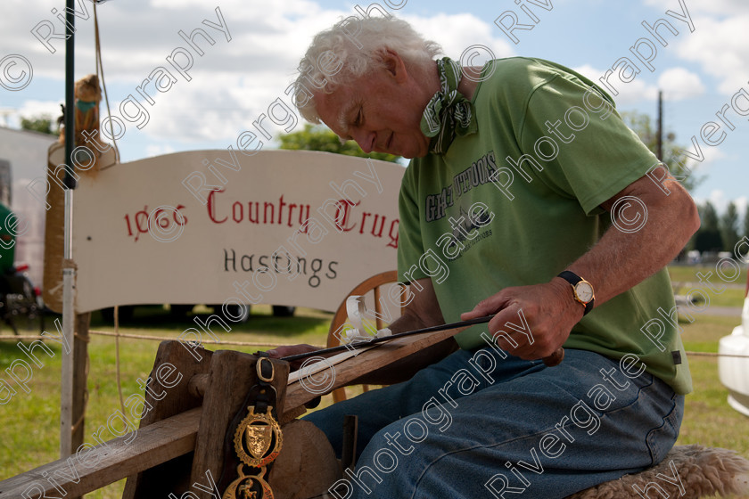 AWC 4973 
 Keywords: 1066 Country trugs, 2010, Ardingly, Hastings, John Carnell, Smallholders Show, gardening, july, willow and chestnut steamed Sussex Garden trug, wooden basket