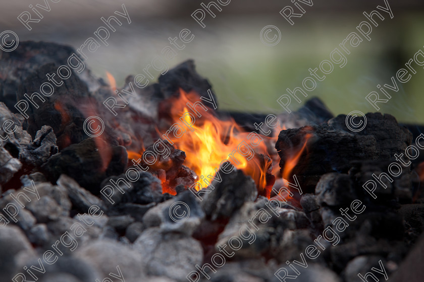 AWC 5142 
 Keywords: 2010, Ardingly, Smallholders Show, anvil, blacksmith, fire, furnace, hot coals, hot july